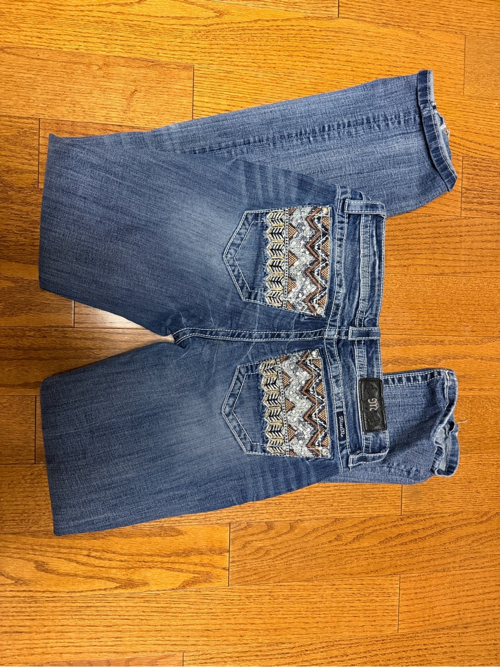 Miss Me, mid rise slim bootcut.